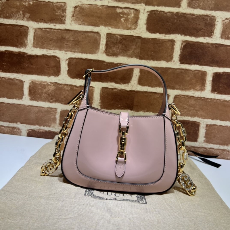 G*u*i top handle bags